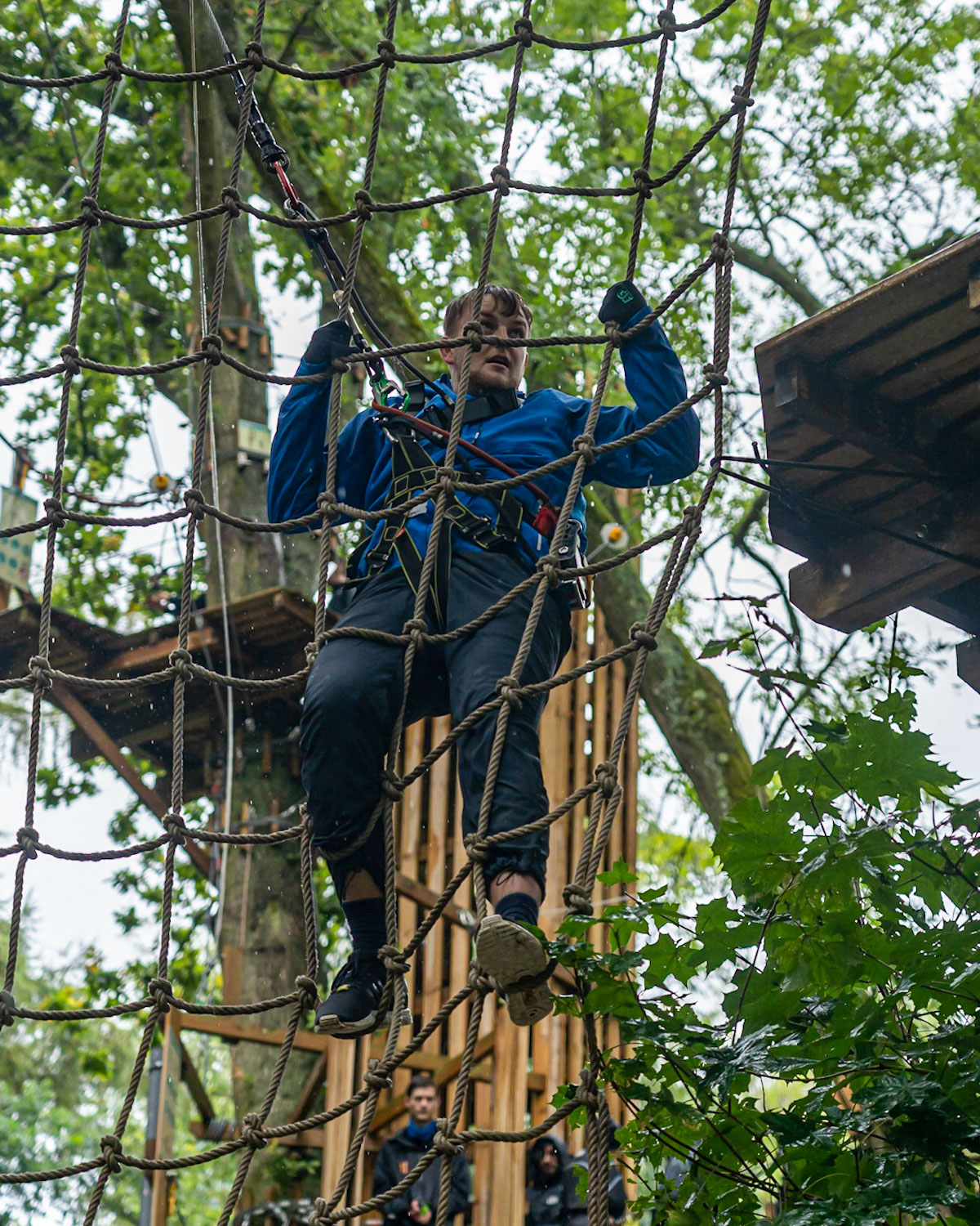 Grabbing onto the cargo net at Go Ape